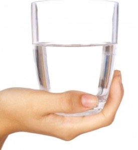 Hand-Holding-Glass-Of-Water-by-photostock-292x318